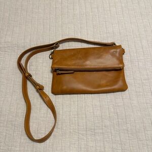ANDAR Quinn crossbody bag in camel tan.